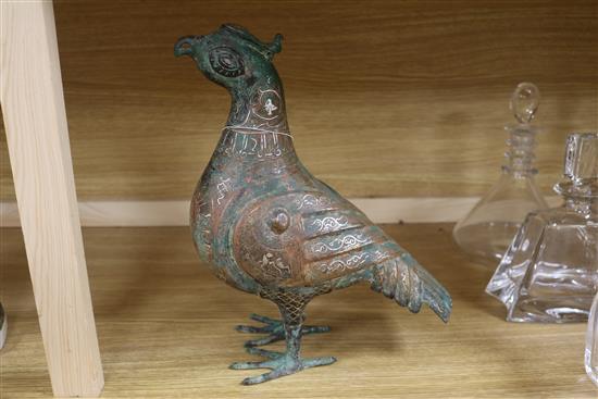 An Islamic bronze bird incense burner